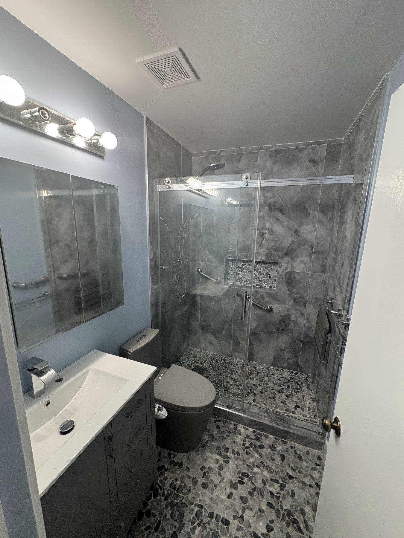 before-and-after of remodeled bathroom